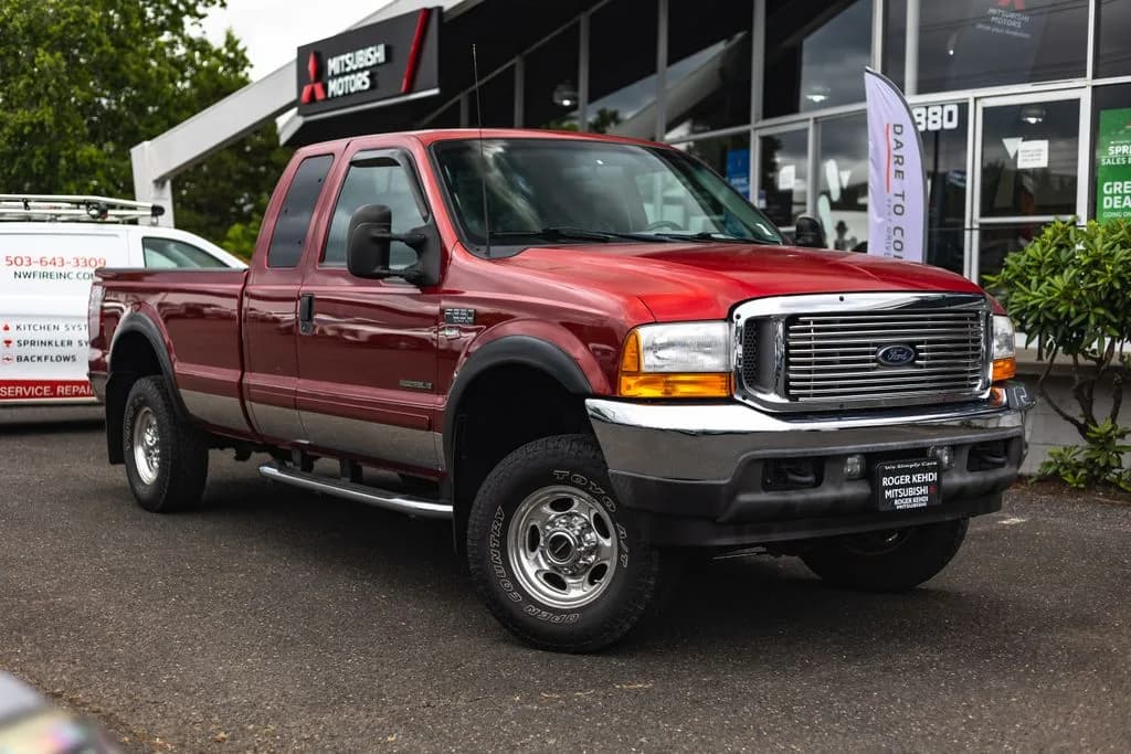 2001 Ford F-250 Super Duty XLT in Toreador Red Clearcoat Metallic for sale at Roger Kehdi Mitsubishi near Portland, Oregon