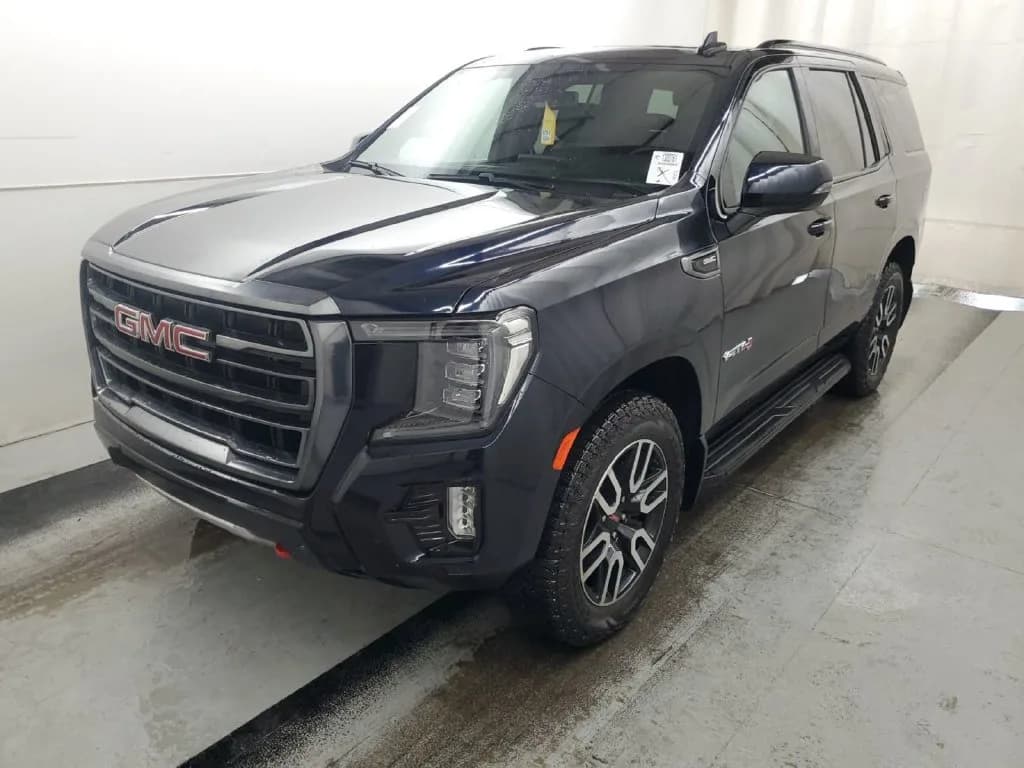 2023 GMC Yukon AT4 in Midnight Blue Metallic for sale at Roger Kehdi Mitsubishi near Portland, Oregon, photo 1 of 7