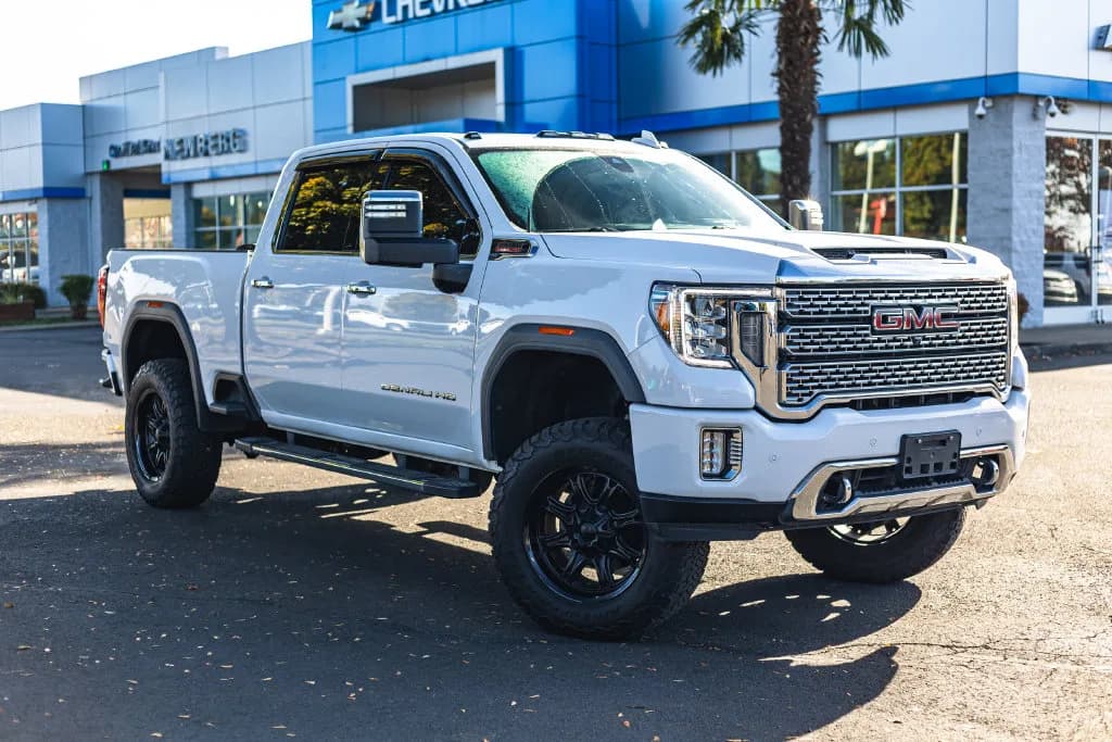 2023 GMC Sierra 3500 HD Denali in White for sale at Newberg Chevrolet in Newberg, Oregon, photo 1 of 10