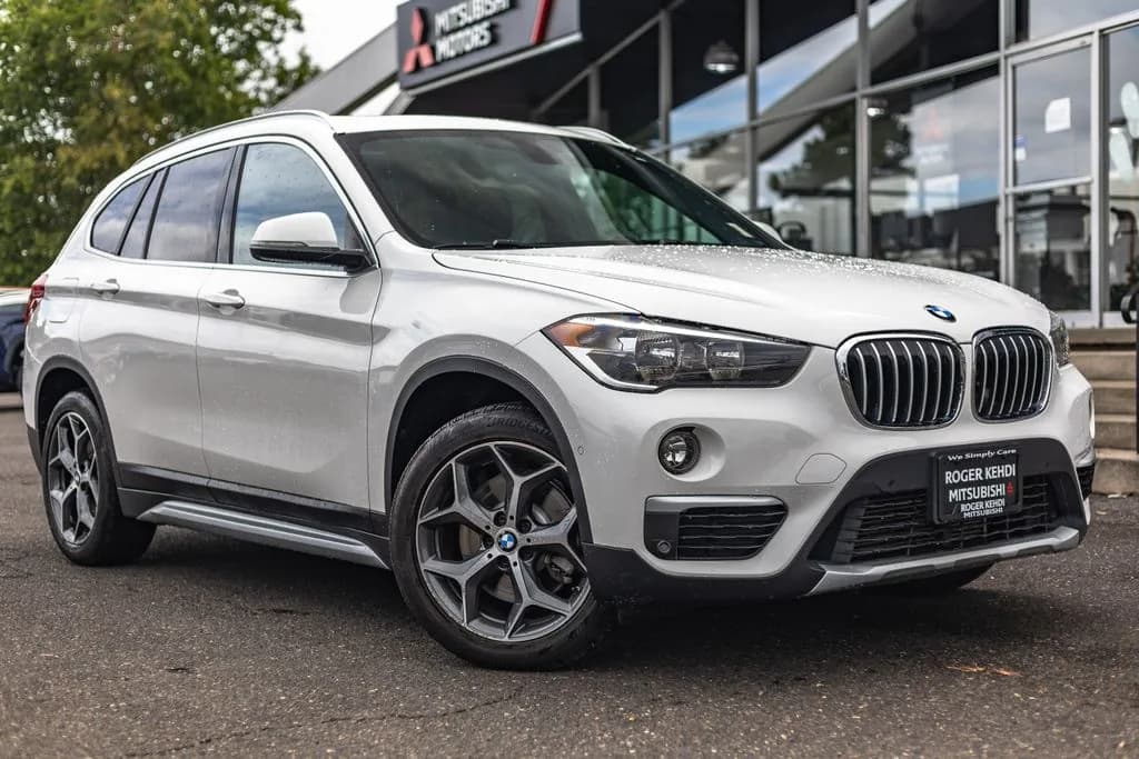 2018 BMW X1 xDrive28i in Alpine White for sale at Roger Kehdi Mitsubishi near Portland, Oregon